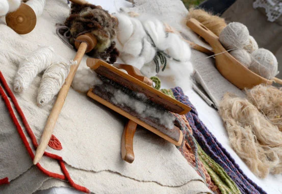 Raw wool and spinning tools